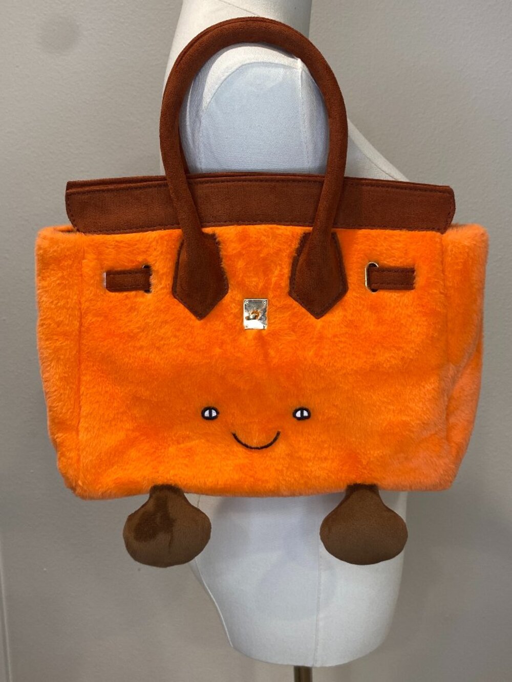 Orange Plush Smiley Handbag with feet